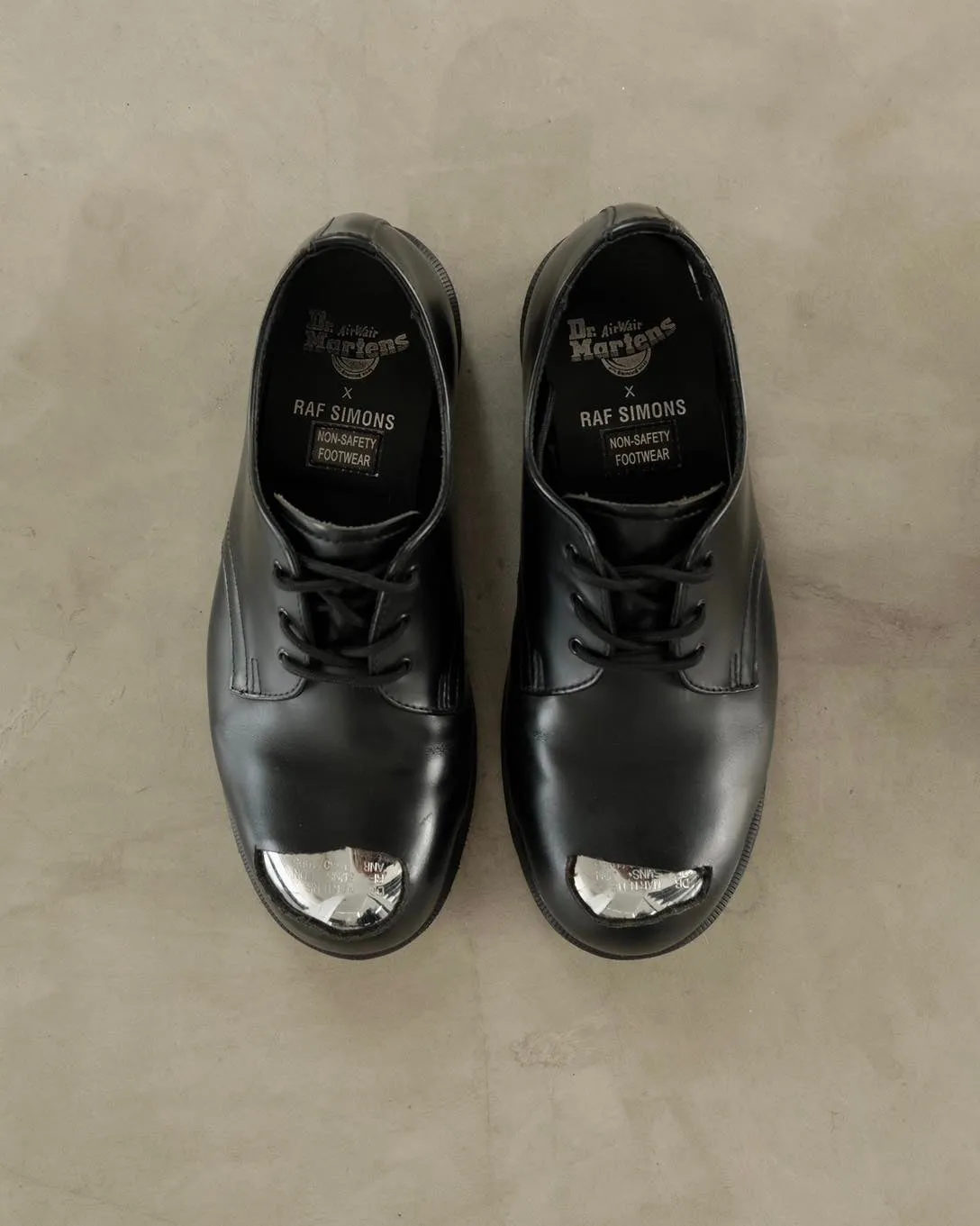 RAF SIMONSX D. MARTENS Cut Out Steel Toe Shoe