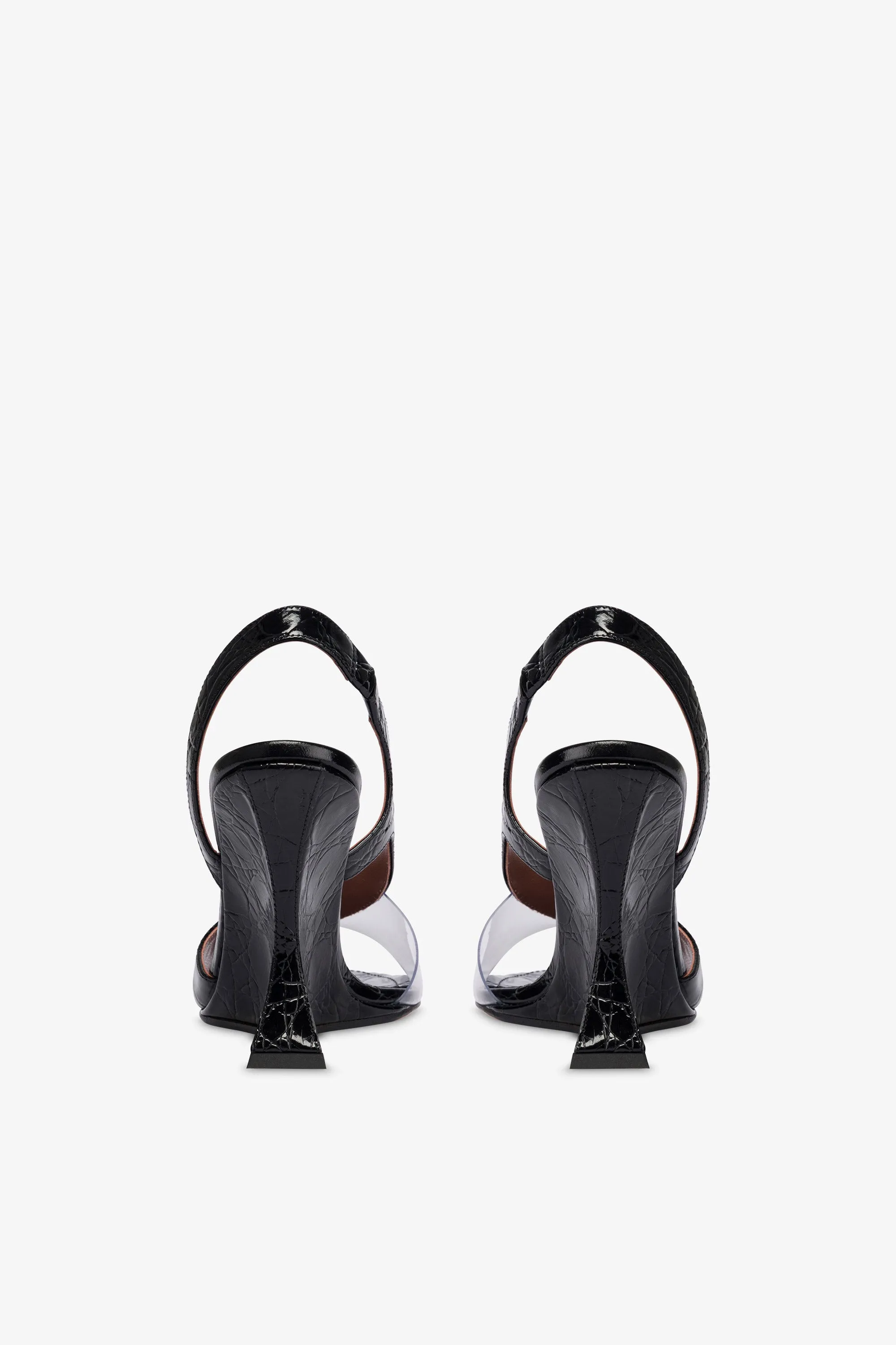 Slingbacks in black PVC and croco-embossed leather