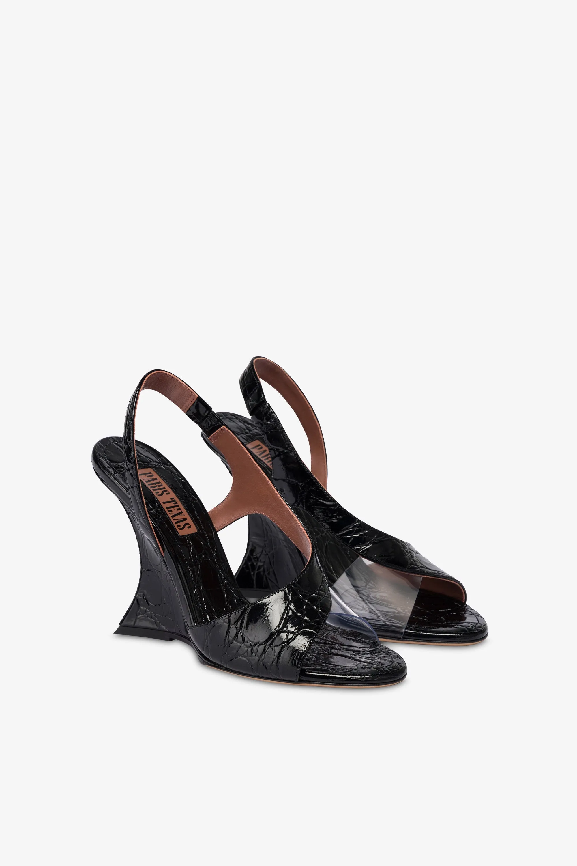 Slingbacks in black PVC and croco-embossed leather