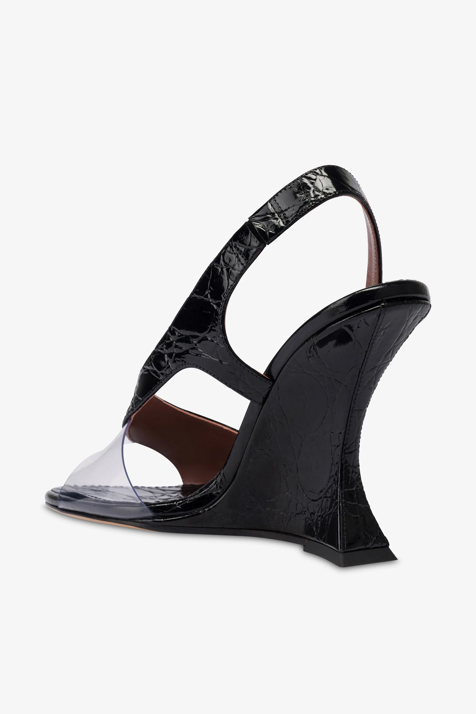 Slingbacks in black PVC and croco-embossed leather